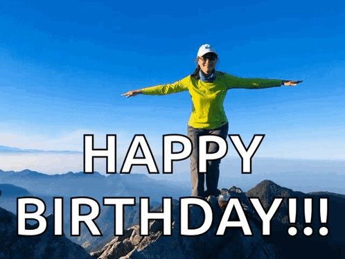 Woman On Mountain Arms Outstretched Saying Happy Birthday GIF