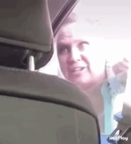 Woman on Phone in Back Seat