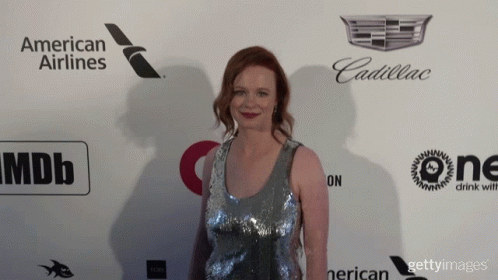 Woman On Red Carpet By American Airlines Cadillac Wall GIF