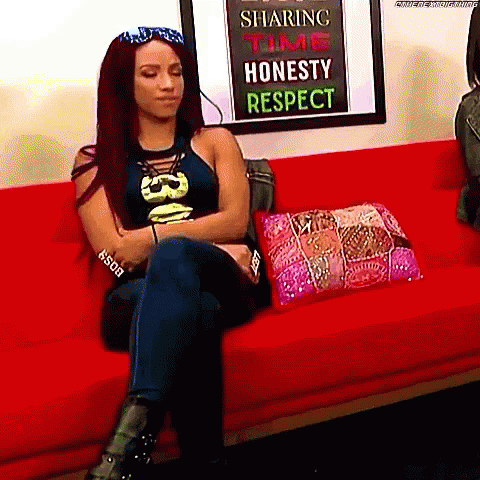 Woman On Red Couch With Sharing Time Honesty Respect Sign GIF