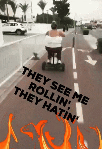 Woman On Scooter They See Me Rollin GIF