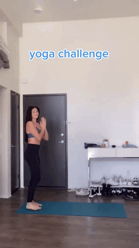 Woman on Yoga Mat with Yoga Challenge Sign