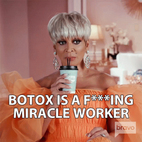 Woman Orange Dress Holding Coffee Botox F***ing Miracle Worker
