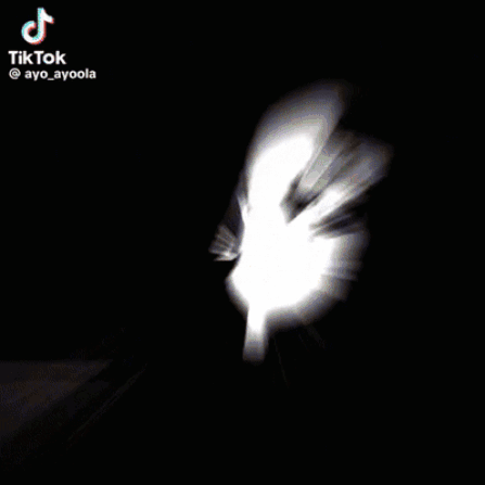 Woman Peeking From Back Of Car GIF
