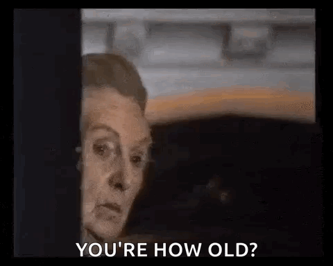 Woman Peeking Out Window Saying You're How Old