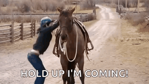 Woman Petting Horse on Dirt Road