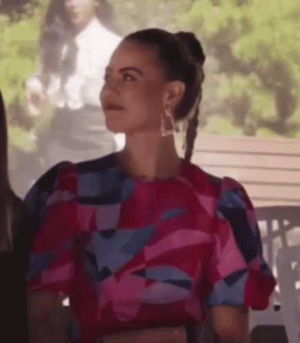 Woman Pink Blue Dress With Others On Bench GIF