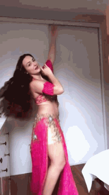 Woman Pink Costume Doing Belly Dance GIF