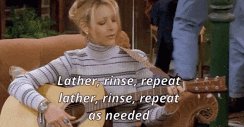 Woman Playing Guitar Lather Rinse Repeat