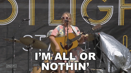 Woman Playing Guitar Singing I'm All Or Nothin GIF