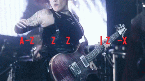 Woman Playing Guitar With Letters A-Z-Z-Z-X