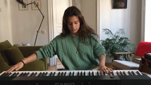 Woman Playing Piano GIF