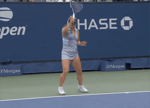 Woman Playing Tennis with Chase Sign