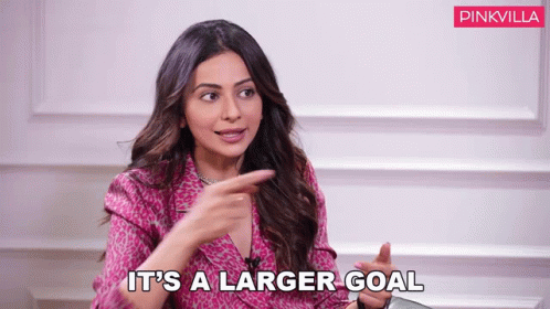 Woman Pointing and Saying Larger Goal