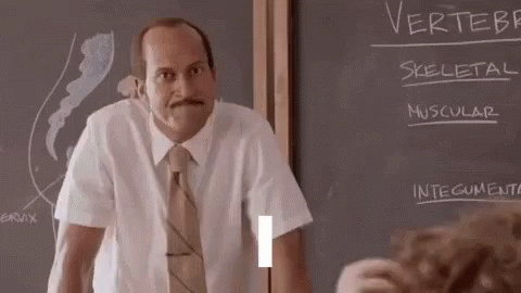 Woman Pointing at Blackboard Child Looks On