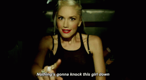 Woman Pointing Nothing's Gonna Knock This Girl Down