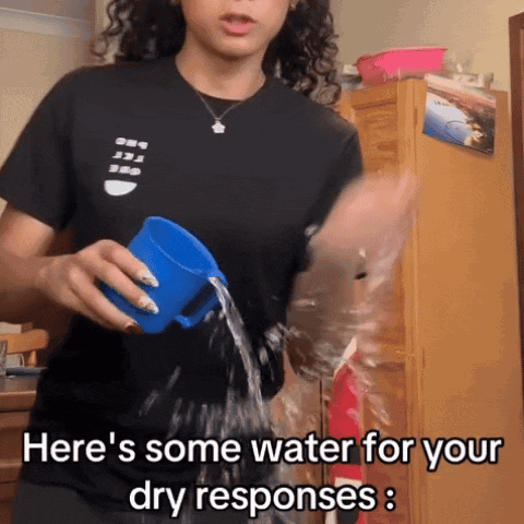 Woman Pouring Water From Blue Cup