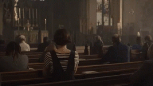 Woman Praying in Church with Amen