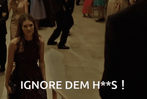Woman Purple Dress Tells Man Ignore Dem H**s GIF
