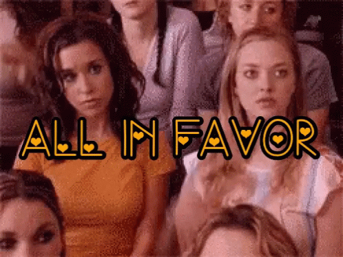 Woman Raising Her Hand All In Favor GIF