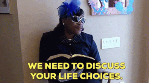 Woman Reading Book Saying We Need to Discuss Your Life Choices