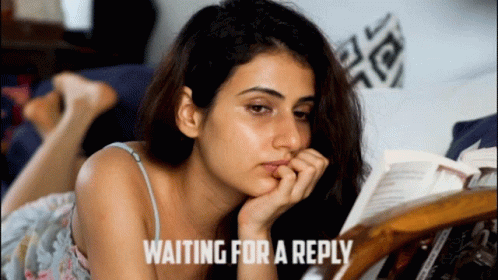 Woman Reading Book Waiting for Reply