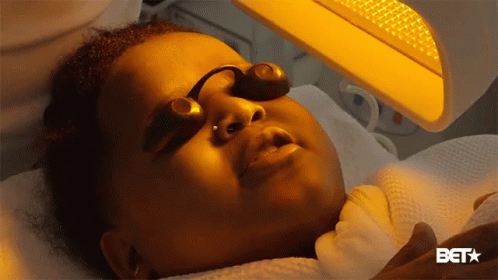 Woman Receiving Facial Treatment