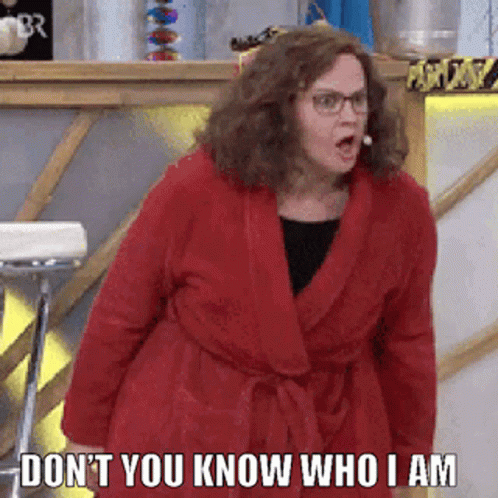 Woman Red Robe Funny Face Don't You Know Who I Am