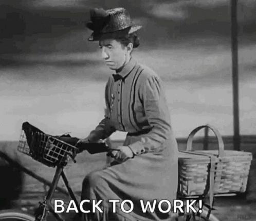 Woman Riding Bicycle Back to Work