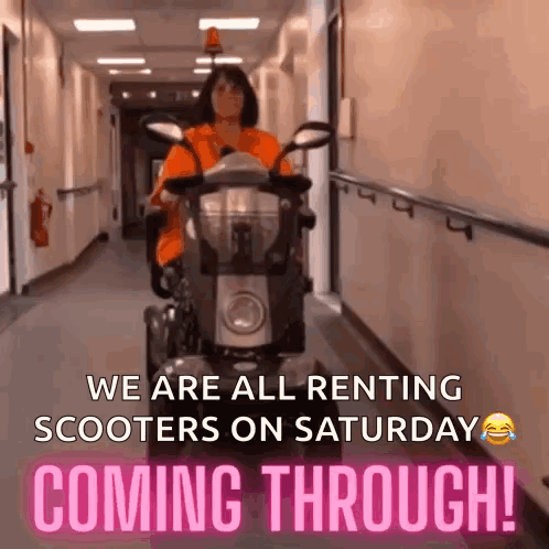 Woman Riding Scooter in Hallway