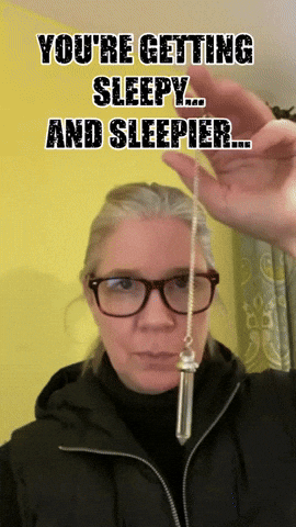 Woman Rocking A Crystal Pendulum GIF