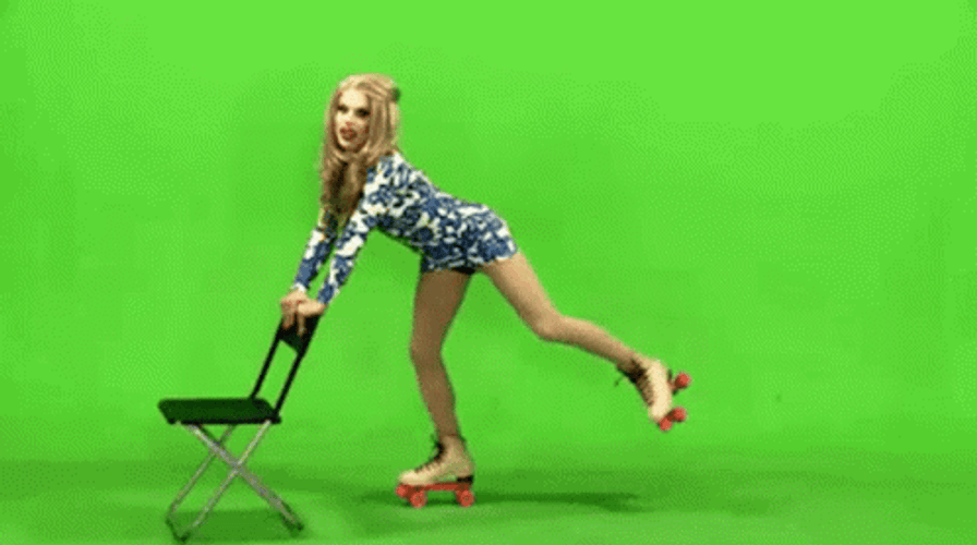 Woman Roller Skating With Chair GIF