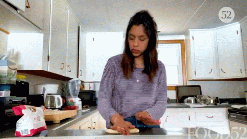 Woman Rolling And Knead Dough GIF