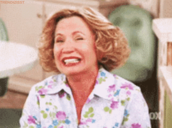 Woman Rolling On The Floor Laughing Hilariously GIF