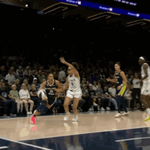 Woman Running On Basketball Court With Minnesota GIF