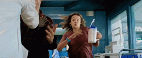 Woman Running With Milk Cup Carried by Man