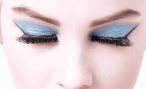 Woman's Eye With Blue Eyeshadow