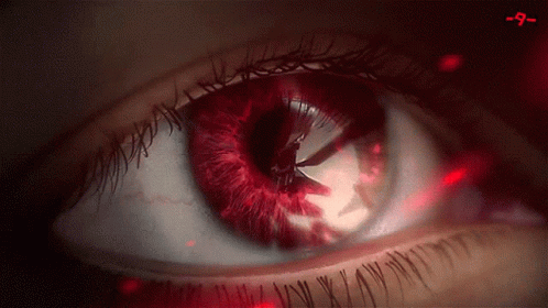 Woman's Eye With Red Pupil And Number 9 GIF