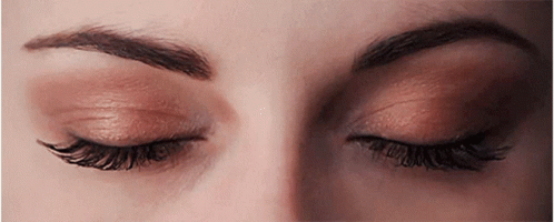 Woman's Eyes Closed Close Up GIF