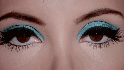 Woman's Eyes With Blue and Black Eye Shadow