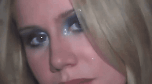 Woman's Face Blonde Hair Blue Eye Makeup