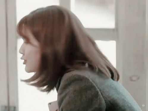 Woman's Face Blowing In Wind GIF