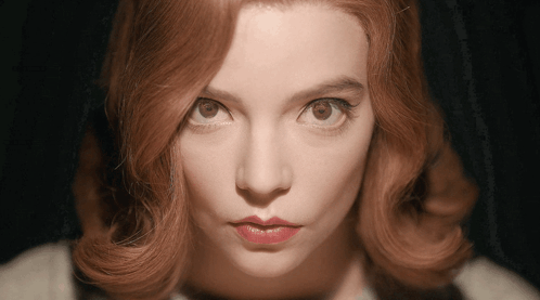 Woman's Face Close-Up Dark Background GIF
