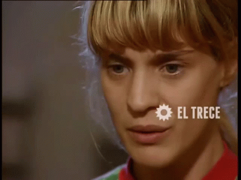 Woman's Face Close Up with El Trece