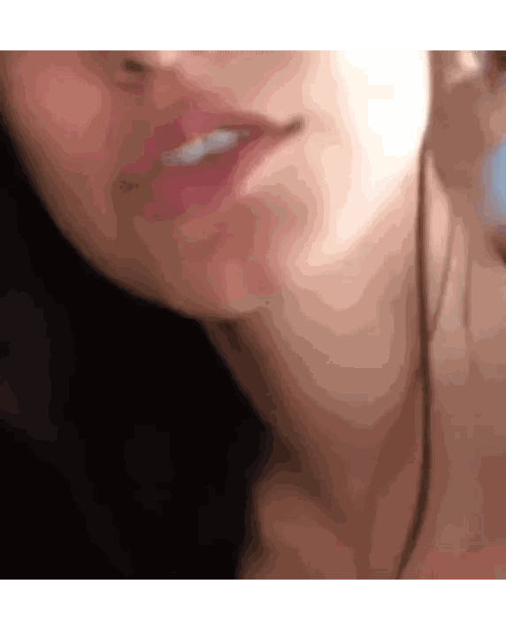 Woman's Face Close Up with Headphones