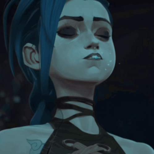 Woman's Face Close Up with P Tattoo