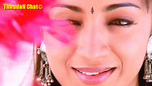 Woman's Face Close Up with Thirugan Chat Watermark