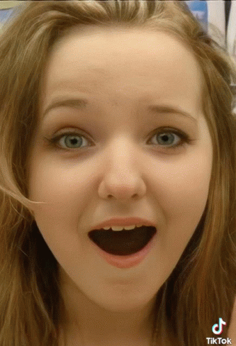 Woman's Face Close Up With TikTok Logo GIF