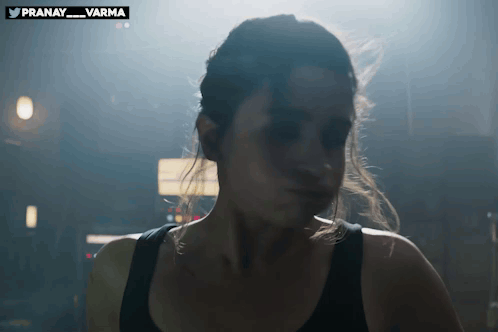 Woman's Face in Dark Room with Pranay Varma Watermark