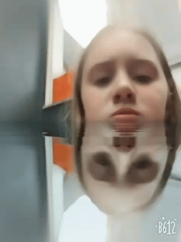 Woman's Face in Mirror with b612